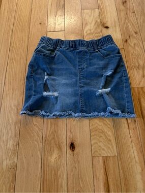 Womens Small denim mini skirt distressed raw hem blue
